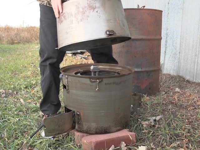  New U.S. Military Surplus Dual Fuel Stove / Heater - image 4 from the video